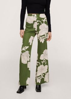 Expertly crafted in a green floral design, this border print pant and jacket suit offers a professional, yet stylish look. With its seamless blend of functionality and fashion, this set is perfect for women who want to maintain a polished and sophisticated appearance without sacrificing style. Measurements are in inches Size Chest Waist Hips Length S 34 25 33 39 M 36 27 35 39.5 L 38 29 37 40 Please take note of the size measurement when ordering your size. Hipster Trousers, Hipster Pants, Floral Trousers, Print Pant, Chic Pants, Jacket Suit, Boho Green, Flare Leg Pants, Printed Trousers