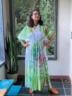 I made this caftan dress from a beautiful watercolor floral pattern and is available in many colors. I used the softest mulmul cotton fabric to make this. It is extremely soft and it gets softer with every wash.It is so free flowing, that it will make you feel as if you aren't wearing anything at all ;)The beauty of the Kaftans is they will fit everyone so no need to worry about the size et all. All my Kaftans have deep necks(11-12 inches) so will fit all head sizes.However, the length of my kaf Floral Print Flowy Maxi Cover-up, Green Floral Print Tunic Kaftan, Green Bohemian Kaftan With Floral Print, Floral Print Maxi Length Summer Kimono, Printed Summer Maxi Dress With Kimono Sleeves, Free Size Floral Print Maxi Dress For Beachwear, Green Floral Print Maxi Kaftan, Beachwear Floral Print Maxi Dress In Free Size, Flowy Floral Print Maxi Length Cover-up