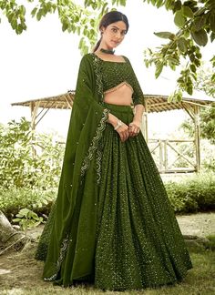 Introducing our exclusive Mehndi Green Lehenga Choli, perfect for Indian weddings and festive occasions. Made of high quality Georgette fabric and adorned with stunning sequins, this ready-to-wear Lahanga Choli will make you stand out from the crowd. Get ready to make a statement in this eye-catching Lengha Choli! The unstitched blouse can be customized upto 46 inches. Do Note: All the accessories shown are for styling purpose only. Slight color variation may occur due to photographic reasons. O Mehndi Green Lehenga, Sequins Lehenga Choli, Indian Wedding Party, Sequins Lehenga, Green Lehenga Choli, Lehenga Choli Designs, Ghaghra Choli, Lehenga Choli For Women, Choli For Women