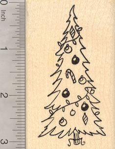 a rubber stamp with a christmas tree on it