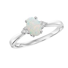 a white opal and diamond ring