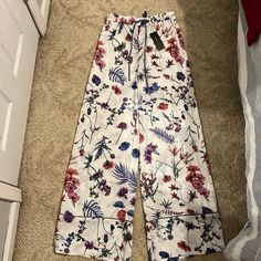 Excellent Condition White Multi Wildflower Floral Print Wide Leg Bottoms For Brunch, Spring Floral Print Wide Leg Loungewear Pants, Spring Floral Print Wide Leg Pants For Loungewear, Printed Wide Leg Pants For Spring Loungewear, Fitted Floral Print Wide Leg Pants For Spring, Scallop Pants, Cream Trousers, Black Linen Pants, Paperbag Pants