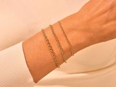 This 14k Yellow Gold 3.0mm Rolo Chain Bracelet is ideal for everyday wear and can be paired with any outfit. It is made of solid gold, which won't tarnish or lose its color, so you can enjoy this beautiful bracelet for years to come. • Material: 14k Solid Gold (Stamped 14K for authenticity) • Color Options: Yellow Gold • Chain Style: Rolo Chain • Chain Width: 3.00 mm • Clasp Type: lobster clasp • Available Lengths: 5", 5.5", 6", 6.5", 7", 7.5", 8" For custom lengths feel free to contact us. We c Classic Gold Bracelet With Rolo Chain, Classic Gold Bracelet With Rolo Chain For Everyday, Classic Gold Rolo Chain Bracelet, Classic 14k Gold Bracelet With Rolo Chain, 14k Gold Rolo Chain Bracelet For Everyday, Yellow Gold Rolo Chain Bracelets For Everyday Wear, Everyday Yellow Gold Rolo Chain Bracelet, Minimalist Yellow Gold Bracelet With Rolo Chain, Bracelet Size Chart