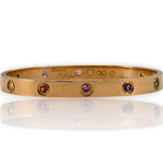 Extended Title - Cartier Love Collection Retired 18kt Rose Gold 10-Stone Love Bracelet with Sapphires, Garnets, and Amethysts Brand Name - Cartier Condition - Pre-Owned Style - Bangle Base Metal - Rose Gold, 18k Length - 7" Width - 5.98mm Weight in DWT - 19.1 Weight in Grams - 29.6 Colored Stone Quantity - 4 Colored Stone Shape - Round Colored Stone Type - Sapphire Colored Stone Creation - Natural Colored Stone Measurements - 0.2 pink sapph 0.2 yellow sapph Colored Stone Quantity - 2 amethyst, 2 tsavorite garnet, 2 hessonite garnet Colored Stone Shape - Round Colored Stone Measurements - 0.2ctw each stone Colored Stone Type - Hessonite Garnet;Amethyst;Tsavorite Garnet; Colored Stone Creation - Natural Markings - Cartier, 750, 17,copyright, AHJ112, sca manufacturer Condition Rating - 9/10 e Cartier Gold Bracelet For Anniversary, Cartier Anniversary Bracelet With Jewels, Cartier Diamond Bracelet With 17 Jewels As Gift, Cartier Luxury Gemstone Jewelry, Luxury Cartier Gemstone Jewelry, Luxury Gemstone Bracelets For Anniversary, Luxury Gemstone Bracelet For Anniversary, Cartier Gold Bracelet With 17 Jewels For Anniversary, Gift Yellow Gold Multi-stone Diamond Bracelet