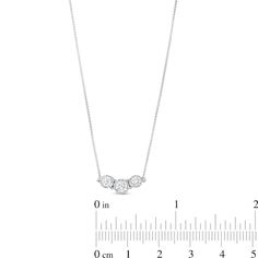 Bring sparkle to your favorite casual or dressy looks with this lab-created diamond three-stone necklace. 14K white gold Features a trio of round certified lab-created diamonds, the largest the 1/4 ct. center stone Each lab-created diamond is artfully set to enhance size and sparkle F color/SI2 clarity with certification card 1/2 ct. t.w. of lab-created diamonds 16.0- to 18.0-inch adjustable box chain necklace; spring-ring clasp Formal White Gold Three Stone Necklace, Diamond White Necklace With Single Cut Lab-grown Diamonds, Formal White Gold Three-stone Diamond Necklace, Three-stone Cubic Zirconia Diamond Necklace In White Gold, Diamond White Three-stone Cubic Zirconia Necklace, Box Chain, Lab Created Diamonds, Three Stone, Stone Necklace