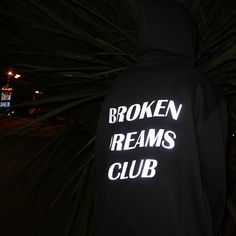 "Broken Dreams Club Hoodie. High-quality, extremely comfy hoodie with a reflective print of our own design. The model is 168 cm (5'6\") tall and has a size XL on. JOIN US ON INSTAGRAM 🌹 http://instagram.com/blvck.pl 🏷 PRODUCT DETAILS 🏷 Hand-printed Unisex 80% High-quality Cotton 20% Polyester Made in Poland 📏 SIZING & FIT 📏 All our sweatshirts and T-shirts are unisex. Measurements (width/length) S - 54/67 cm (21\"/26\") M - 57/69 cm (22.5\"/27\") L - 60/71 cm (23.5\"/28\") XL - 63/73 cm Hooded Hoodie With Text Print For Streetwear, Streetwear Hoodie With Text Print, Text Print Hoodie For Streetwear, Broken Dreams, Cyberpunk 2077, Black Aesthetic, The Words, Cyberpunk, White