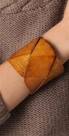 "Get a statement piece! A cuff that would stand out! combining a clean and a Boho look.  Rich leather, all natural dyes and process handmade by artisans in Morocco. Measures: Women's leather cuff, braided pattern 2.75\" wide ,8\"-8.5\" long when closed , two snaps adjustment" Art Du Cuir, Crea Cuir, Diy En Cuir, Wrap Armband, Handmade Leather Jewelry, Boho Cuff, Leather Jewellery, Handmade Leather Bracelets, Braided Leather Bracelet