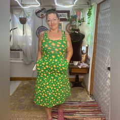 Tabitha Brown Green Orange & Yellow Floral Midi Dress Size Xxsmall Pre-Loved! Approximate Measurements, Flaws (If Any) & Fabric Tag All Shown In Photos. Model :Me 5ft 2in 149 Lbs Measure H:39in W:32in C:34in / Average Size 6/8 / Small / Shoe Size 7.5 Smoke Free Home. All Items Are 100% Authentic And Ship Next Day From Sunny Florida. Offers / Counter Offers Always Welcome!! *** Feel Free To Comment Or Message Me With Any Questions. *** I Will Accept Or Counter My Lowest. Bundles Always Get A Disc Orange Cotton Midi Sundress, Orange Fitted Midi Sundress, Yellow Cotton Knee-length Sundress, Tabitha Brown, Fabric Tags, Brown Dress, Floral Midi Dress, Green Orange, Yellow Floral