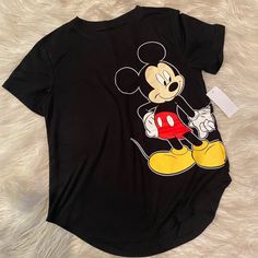 Women’s Mickey And Minnie Disney Shirt. Perfect For Disneyland. The Front Has Mickey And The Back Minnie. Soft Loose Fitting Comfortable Shirt. Brand New. Various Sizes Black Disney T-shirt For Disney Trips, Black Mickey Mouse Shirt For Disney Fan Events, Fun Mickey Mouse Shirt For Disney Trips, Graphic Tee For Disney Trips In Black, Black Graphic Tee For Disney Trips, Black Disney Short Sleeve Shirt, Casual Black Shirt For Disney Trips, Mickey Mouse Crew Neck Top For Streetwear, Cotton Mickey Mouse Tops For Disney Trips