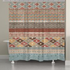 a shower curtain with an ethnic pattern on it