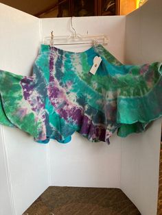 Beautiful tie dyed skirt Fitted Bohemian Skirted Skort, Bohemian Fitted Skirted Skort, Fitted Bohemian Tie-dye Skirt, Fitted Bohemian Tie Dye Skirt, Fitted Tie Dye Bohemian Skirt, Bohemian Fitted Skort For Summer, Summer Bohemian Fitted Skort, Bohemian Asymmetrical Mini Skirt For Summer, Bohemian Tie Dye Tiered Skirt