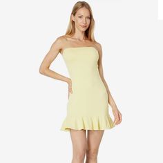 Susana Monaco Strapless Ruffle Hem Dress In Custard. Nwt, Size Xl. Still In Original Packaging. Perfect For The Beach Or Resort, The Susana Monaco Strapless Ruffle Hem Dress Is A Form-Fitting And Versatile Number You Need This Season. Strapless Dress Made With An Elastic Band To Stay In Place. Flowing Ruffle Hem. Pull-On Styling. 86% Nylon, 14% Spandex. Hand Wash, Dry Flat. Made In The U.S.A. Spring Strapless Dress With Ruffles, Yellow Stretch Mini Dress With Ruffles, Spring Strapless Dress With Ruffles And Straight Neckline, Strapless Stretch Sundress, Chic Yellow Mini Strapless Dress, Spring Strapless Stretch Dress For Brunch, Yellow Strapless Mini Dress For Summer, Yellow Strapless Mini Dress For Brunch, Yellow Strapless Mini Dress For Date Night