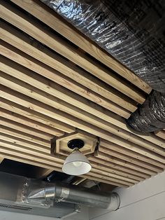 the ceiling is covered with duct tape and wood slats