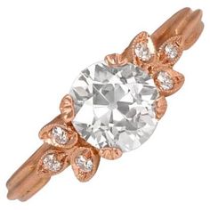 a rose gold ring with an oval cut diamond