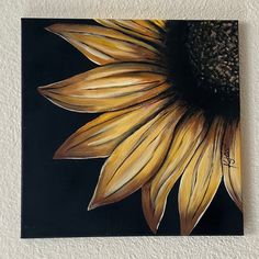 a painting of a yellow sunflower on a black background