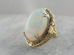 Vintage 14k Stamped Opal Ring For Formal Occasions, Ornate Yellow Gold Gemstone Rings, White Domed Rings For Anniversary, Antique Domed Ring, Vintage Collectible Opal Gemstone Ring, White Domed Anniversary Rings, Antique Domed Hallmarked Ring, Classic Domed Collectible Jewelry, Gold Opal Ring Collectible Classic Style