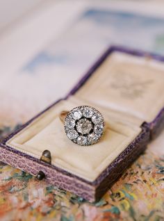 Antique Old Mine Cut Diamond Cluster Ring The Wrenley ring is an authentic antique diamond cluster ring from the Georgian Era circa 1820. The ring centers an approximately 1-carat Old Mine Cut diamond surrounded by a halo of 8 smaller Old Mine Cut diamonds, all totaling approximately 3.20 carats. All of the diamonds are approximately J-K in color, VS-SI clarity. The stones are set in a silver-topped 14kt yellow gold setting with a closed back. The ring is currently size 8.75 and can be resized! Victor Barbone Jewelry, Georgian Era, Old Mine Cut Diamond, Golden Ring, Silver Tops, Yellow Gold Setting, Antique Diamond, Diamond Cluster Ring, Diamond Cluster