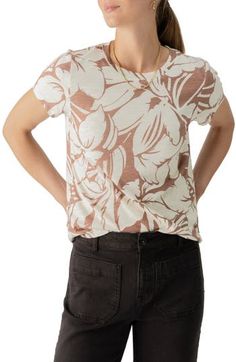 Jazz up your laid-back look with a cotton-first top covered in a groovy print. 24" length (size Medium) Crewneck Short sleeves 51% cotton, 49% rayon Machine wash, dry flat Imported Casual T-shirt With Abstract Print, Spring Stretch Top With All Over Print, Stretch Top With All Over Print For Spring, Casual Stretch Top With Abstract Print, Stretch Tops With All Over Print For Spring, Casual Stretch Tops With Abstract Print, Cotton Retro Print Vacation Top, Cotton Retro Print Top For Vacation, Spring Cotton Tops With Abstract Print