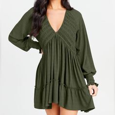 This Dress Features Unique Smocked Detailing And A Boho Feel That Is Perfect For Any Season. Fit: Relaxed - Roomy But Not Oversized Closure: Slip On Material: 87% Polyester, 13% Spandex Long Sleeve Dark Green Mini Dresses, Long Sleeve Babydoll Dress, Float Dress, Grey Long Sleeve Dress, Cheetah Print Dress, Green Mini Dress, Sparkly Dress, Mini Sweater Dress, Black Long Sleeve Dress