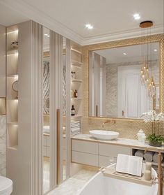 a bathroom with a large mirror, sink and bathtub next to a white toilet