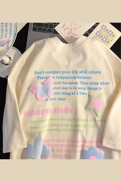 Oversized Long Sleeve T-shirt With Cartoon Print, Oversized Spring Tops With Cartoon Print, Oversized Pink Top With Graphic Design, White Long Sleeve Printed T-shirt, Cute Oversized Slogan Tops, Oversized Cartoon Print T-shirt For Spring, Oversized Printed Cotton Tops, Oversized Cotton Tops With Printing, Oversized Cotton Top With Printing