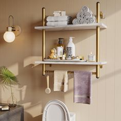 two shelves with towels, soaps and other items on them in a bathroom setting