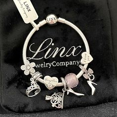 Linx Snake Chain Style Charm Bracelet In 925 Sterling Silver, With A Ball Clasp. The Bracelet Is 3mm In Width And Available In Multiple Lengths. This Bracelet Comes With 7 Linx 925 Sterling Silver Charms. All Items Are New And Come In A Luxury Velvet Jewelry Pouch. *Bracelet And Charms Are Superior Quality! Elegant Silver Wedding Charms, White Gold Charm Bracelet Gift Fine Jewelry, White Gold Charm Bracelet Fine Jewelry, Elegant Sterling Silver Charms In White Gold, White Gold Fine Jewelry Charm Bracelet Gift, Elegant White Gold Sterling Silver Charms, Wedding Silver Charms, Luxury Sterling Silver Charm Bracelet As A Gift, Luxury Sterling Silver Charm Bracelet Gift