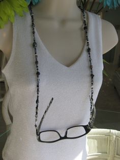 Black Eyeglass Chain Black Necklace Eyeglass by RalstonOriginals, $15.00 Black Beaded Glass Necklaces, Black Glass Beaded Necklaces With Round Beads, Black Beaded Glass Necklace, Black Glass Beaded Necklace With Round Beads, Handmade Black Glass Beads, Handmade Glass Beads In Black, Black Glass Round Bead Jewelry, Black Glass Round Beads Jewelry, Black Glass Beaded Jewelry