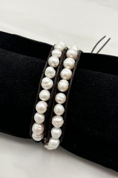 This Freshwater Pearl Strand and Leather Double Wrap Bracelet combines elegance and versatility. The freshwater pearls add a touch of sophistication while the leather double wrap design allows for easy adjustment and comfortable wear. Perfect for both formal occasions and everyday wear. Details:- Double Wrap Style Bracelet- 4 Adjustable Settings- Genuine Leather and Freshwater Pearls Dimensions:- 18.5" Total Length- Adjustable by 3-3.5" Double Wrap Bracelet, Pearl Strand, Pearl Strands, Deep Brown, Leather Wrap Bracelet, Leather Wraps, Formal Occasion, Wrap Style, Fashion Bracelets