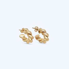 Named after our mother/grandmother, the Barbara twisted earrings are a modern take on a pair of her much loved hoops. Two intertwined polished gold strands create the classic circular shape. **Gold filled 14k gold over brass. *Waterproof. 3 Sizes Barbara diameter is 1.25" Mini Barbara diameter is .75" Huggie diameter is .50" *Waterproof but will be damaged by chlorine and other harsh liquids. **Our gold filled earrings have layers of 14k gold over brass. They have the look and color of solid gol Modern Twisted Jewelry For Everyday, Modern Twist Everyday Earrings, Twisted 14k Gold Earrings, Everyday Twisted Yellow Gold Jewelry, Twisted Yellow Gold Jewelry For Everyday, Everyday Jewelry With Modern Twisted Style, Everyday Twisted Modern Jewelry, Modern Twisted Jewelry For Anniversary, Minimalist Twisted Yellow Gold Jewelry