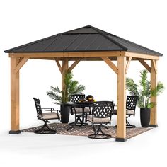 a wooden gazebo with chairs and tables under it on a white background in front of some potted plants