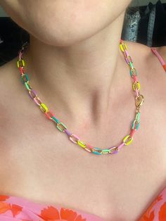 Length: 18" Chain Material: gold plated over brass & finished with enamel Link size: 7x11 mm Thickness: Approx. 2mm CARE: In order to ensure your jewelry stays looking as fantastic as possible, avoid swimming, showering, and spraying perfume directly on the piece. To clean, wipe down with a clean and dry cloth. Multicolor Necklaces With Gold Chain For Gift, Multicolor Paperclip Chain Jewelry For Gifts, Multicolor Paperclip Chain Necklace As Gift, Multicolor Paperclip Chain Necklace For Gift, Multicolor Paperclip Chain Necklace Gift, Colorful Chain Necklace For Gifts, Colorful Chain Jewelry For Gifts, Colorful Chain Jewelry As Gift, Spraying Perfume