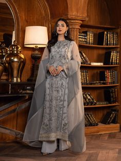 Brand: SIFAProduct Code: FU-23-08-EnoraCollection: SIFA Lueur Unstitched Luxury Formal Collection DESCRIPTION﻿: The aesthetic outfit features a graceful yet elegant silhouette with captivating floral embroidery in shades of blue embellished with sequins and tilla, fully embroidered front with pronominal embroidery on its border. It is paired with beautifully composed dupatta with color blocking and embroidery details on it paired with raw silk trouser. It’s a perfect outfit for any festive event Chiffon Dresses, Elegant Embroidery, Chiffon Fashion, Silk Trousers, Pakistani Suits, Chiffon Shirt, Fabric Stores Online, Formal Looks, Formal Outfit