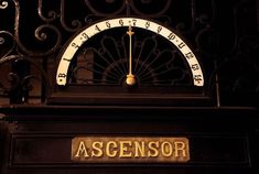 an old fashioned clock with the word ascendor on it