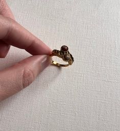 Vintage Vogue gold tone brown beads adjustable ring in great vintage condition. Vintage Gold Plated Rings, Adjustable Brown Ring Jewelry, Adjustable Antique Brown Jewelry, Antique Adjustable Brown Jewelry, 1970s Bands, Vogue Vintage, Vintage Vogue, Adjustable Ring, Adjustable Rings