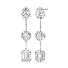 These earrings feature a delightful combination of heart-shaped and pear-shaped diamonds. Each shape exudes its own unique charm, creating an engaging and captivating design that is both classic and contemporary.These earrings are designed to complement a wide range of outfits and occasions. Whether you're dressing up for a special event or enhancing your daily look, they add a touch of glamour and personality to your style. White Gold Teardrop Chandelier Earrings Fine Jewelry, White Gold Teardrop Chandelier Earrings, Luxury Dangle Teardrop Earrings For Anniversary, Formal Fine Jewelry Diamond Earrings With Timeless Design, Timeless Fine Jewelry Diamond Earrings For Formal Occasions, Formal Timeless Diamond Earrings, Diamond Earrings For Gifts, Modern Pear-shaped Earrings For Anniversary, Elegant Pear-shaped Diamond Earrings With Diamond Cut