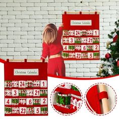 a christmas calendar hanging on a brick wall next to a christmas tree and other decorations