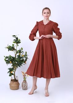 "It is ideal for daily wear, party, travel, work, school, indoors and outdoor walks, spending time with family, shopping, etc.The dress is exceptionally comfortable and soft. DETAIL - 100% linen, soft washed - Medium weight linen - Long Sleeves - With pockets - No lining, Don't see through - retro style -Colour:Rust red Choose CUSTOM Order if you * Need a better fit * Can't find your size in our size Chart * Change the Style * Change the long We do make custom made clothes.  Just let us know you Fall A-line Midi Dress With Pleated Sleeves, Long Sleeve Summer Dresses For Office, Formal Midi Dress With Gathered Sleeves For Fall, Summer Office Dress With Long Sleeves, Red Midi Dress With Gathered Sleeves, Long Sleeve Midi Dress For Dress-down Occasions, Long Sleeve Summer Dress For Formal Occasions, Long Sleeve Midi Dress For Dress Down, Summer Office Long Sleeve Midi Dress