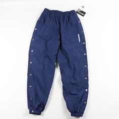 Vintage 90s Diadora Soccer Snap Button Jogging Pants Jogging Pants New With Tags Blue The Size Is Small Measurements Are: 28 Inch Inseam 39 Inch Overall Length 12 Inch Waist Laid Flat Polyester Check Out My Other Items In My Store Vogue Squared! N132 Casual Bottoms With Buttons For Streetwear, High Waist Blue Pants With Button Zip Fly, High-waist Blue Pants With Button Zip Fly, Blue High-waist Pants With Button Zip Fly, Retro Blue Bottoms For Streetwear, Vintage Blue Bottoms With Button Closure, Casual Blue Bottoms With Button Zip Fly, High Waist Button Closure Streetwear Bottoms, High Waist Pants With Button Closure For Streetwear