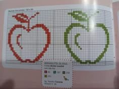 the cross stitch pattern shows an apple and a half - eaten apple on pink paper