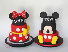 two cakes decorated to look like mickey and minnie mouse