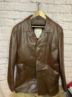 Vintage Leather London Fog Jacket 70s/80s 42 Extra Long Men’s Brown Soft ￼Disco. Missing bottom button. Top button is hidden under the collar and can be moved to the bottom. Vintage Leather Jacket With Snap Buttons For Business, Vintage Leather Jacket With Pockets For Formal Occasions, Vintage Business Outerwear With Button Closure, Vintage Leather Jacket With Pockets For Formal Wear, Vintage Formal Leather Jacket With Pockets, Vintage Leather Sport Coat For Fall, Vintage Brown Leather Jacket For Formal Occasions, Vintage Single Breasted Leather Jacket For Formal Occasions, Vintage Business Leather Jacket With Pockets