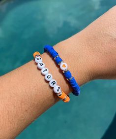 College Football Bracelets, Casual Customized Blue Beaded Bracelets, Casual Blue Customizable Beaded Bracelets, Customized Blue Beaded Bracelets For Everyday, Customizable Casual Blue Jewelry, Casual Customizable Blue Jewelry, Casual Blue Customizable Jewelry, Personalized Blue Casual Wristband, Customized Casual Everyday Wristband