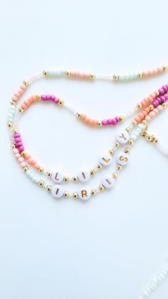 ❤️ PRODUCT DETAILS❤️ ❤️ Colorful Pastel Color Custom Necklaces are handmade to use everyday or make stacks. You can use with more necklaces for a rich look or wear it alone for a chic style. It is also personalized.  Materials: Glass beads, Letter Alphabet Beads and 14k gold plated beads.  Style: Letter bead necklace, customize initial necklace, colorful pearl seed bead necklace, pearl choker, colorful necklace, seed beed necklace, dainty necklace, boho necklace, minimalist  ❤️ CARE ❤️ ❤️ Keep jewelry dry and avoid contact with water, lotions, etc ❤️ SIZE❤️ If you want a different length, write the size in the message to seller box when you check out.  Lenght: 15-16 inch/38-41 cm. ❤️ PACKAGING ❤️ ❤️ Each order comes with a lovely gift box Please check your bracelets size when you buy it. N Cheap Rainbow Beaded Necklaces With Letter Beads, Adjustable Letter Beads Jewelry For Personal Use, Adjustable Letter Beads Jewelry For Crafting, Personalized Round Beads Jewelry For Personal Use, Personalized Jewelry With Round Beads For Personal Use, White Letter Beads Jewelry For Crafting, Personalized Adjustable Jewelry, Adjustable Pink Necklace With Custom Name, Handmade White Beaded Necklaces For Personal Use