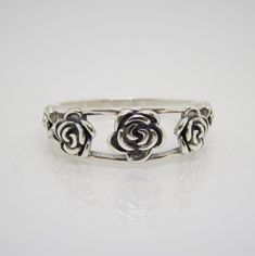 Vintage Sterling Silver Roses Flowers Ring ....Marked 925...Total of weights 2.5grams...Size 7....Measure of Face 6.7MM....It's in very good condition. Flowers Ring, Silver Flower Ring, Flower Ring, Silver Roses, Ring Size 7, Sterling Silber, Vintage Sterling Silver, Vintage Silver, Etsy Vintage