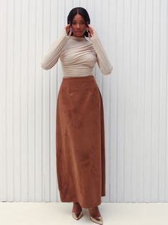 Introducing our Coffee Brown Vegan Suede Skirt – the perfect blend of fashion and modesty. Embrace the timeless elegance of this skirt, designed for the fashion-forward yet conservative woman. Crafted from high-quality faux suede, this long skirt is a must-have for every wardrobe. Our modest skirt caters to those who appreciate classic style without compromising on contemporary trends. The rich coffee brown color adds a touch of sophistication, making it suitable for various occasions. Key Features: Modest Elegance: Elevate your style with our ankle length skirt, embracing a blend of contemporary fashion and timeless modesty. Faux Suede Perfection: Crafted from premium faux suede, our skirt promises a luxurious feel and a cruelty-free option for the conscious fashionista. Versatile Wardrob Conservative Woman, Coffee Brown Color, Brown Suede Skirt, Modest Skirt, Faux Suede Skirt, Ankle Length Skirt, Suede Skirt, Coffee Brown, Timeless Pieces