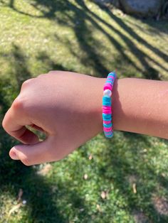 Pretty Blue and Pink Bracelet.This can be for all ages.Please do not over stretch as this can snap! Fun Blue Bracelets For Gifts, Playful Adjustable Blue Friendship Bracelets, Playful Blue Beaded Bracelets, Fun Blue Beaded Friendship Bracelets, Playful Blue Beaded Bracelet, Playful Blue Friendship Bracelets With Round Beads, Handmade Blue Playful Friendship Bracelets, Blue Handmade Friendship Bracelets Playful Style, Handmade Blue Friendship Bracelets Playful Style