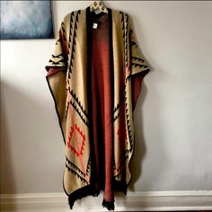 Brand New With Tags! Great Print Oversized Bohemian Outerwear With Fringe, Casual Brown Poncho For Festival, Brown Bohemian Cape Outerwear, Bohemian Brown Cape Outerwear, Oversized Brown Poncho For Festivals, Oversized Brown Bohemian Cape, Oversized Brown Bohemian Poncho, Oversized Fall Festival Cape, One Size Cozy Outerwear For Festivals