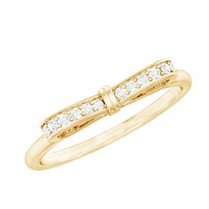 a yellow gold ring with diamonds on it