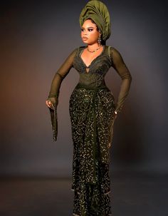 Elevate your presence at any event with our exquisite dark green luxury lace dresses. Crafted with precision and elegance, these dresses are designed to make you stand out. The rich, dark green hue adds a touch of sophistication, while the intricate lace material exudes luxury and charm. Perfect for weddings, parties, or any special occasion, these dresses ensure you make a lasting impression wherever you go. Key Features: 🌟 Intricate dark green lace material that exudes luxury and sophistication, ensuring all eyes are on you. 👗 Flattering silhouette that accentuates your curves and enhances your feminine allure, making you feel confident and beautiful. 💃 Versatile design suitable for various occasions, from elegant weddings to glamorous parties, ensuring you're always dressed to impres Wedding Groomsmen Attire, Traditional Skirts, Wedding Guest Gowns, Traditional Wedding Dress, Intimate Gathering, Green Luxury, Traditional Wedding Attire, Elegant Weddings, Bridal Attire